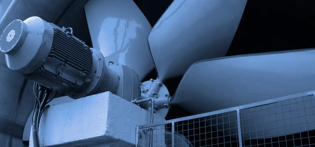 FRP cooling tower fan impeller with its electric motor on a concrete support
