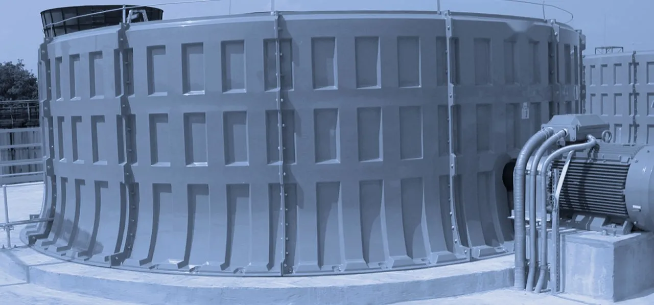 FRP fan stack on a cooling tower with the electric motor and drive alongside