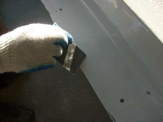 FRP repair kit being applied to a fan stack surface